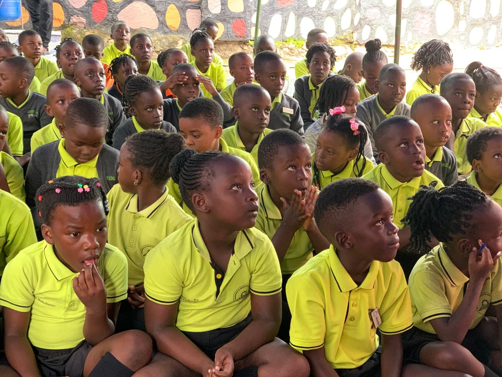The whole school at assembly under the tent