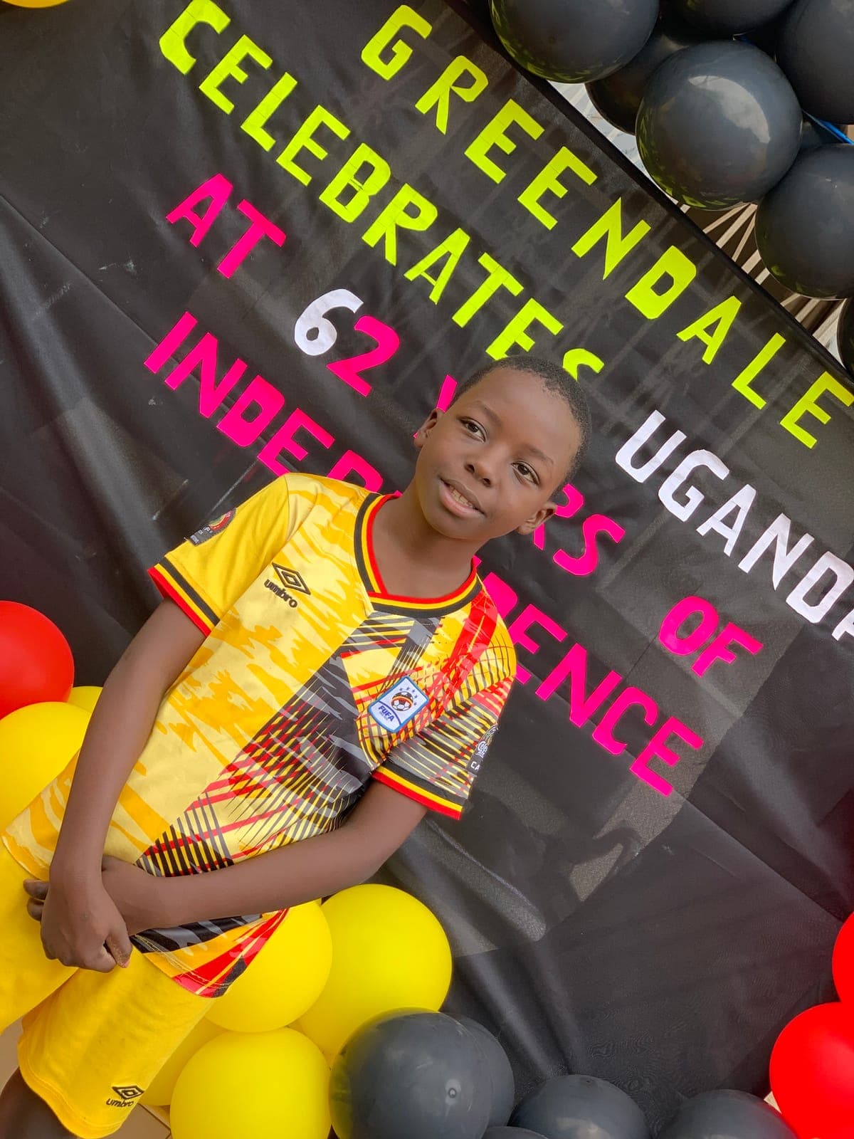 A portrait against the celebration banner